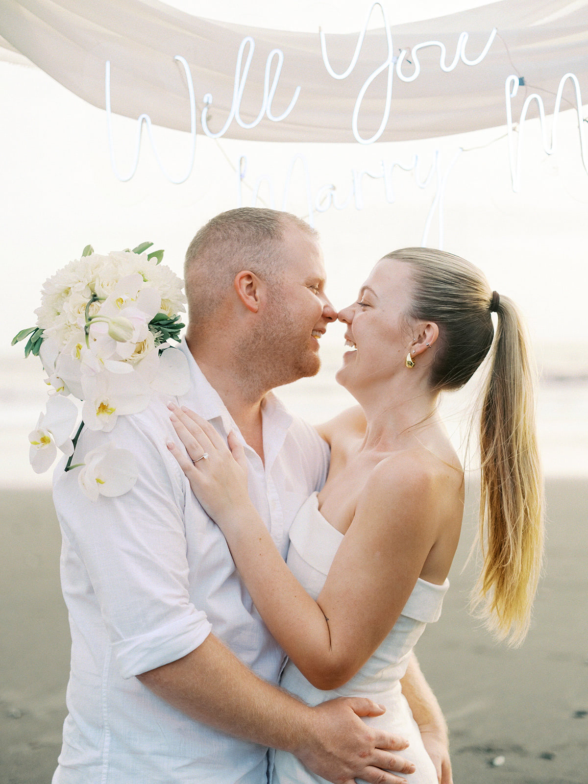 dreamy bali beach proposal photoshoot